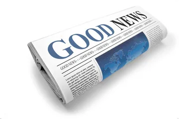 Rolled newspaper with 'Good News' headline and blue section visible